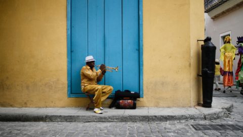 man playing a trumpet in cuba