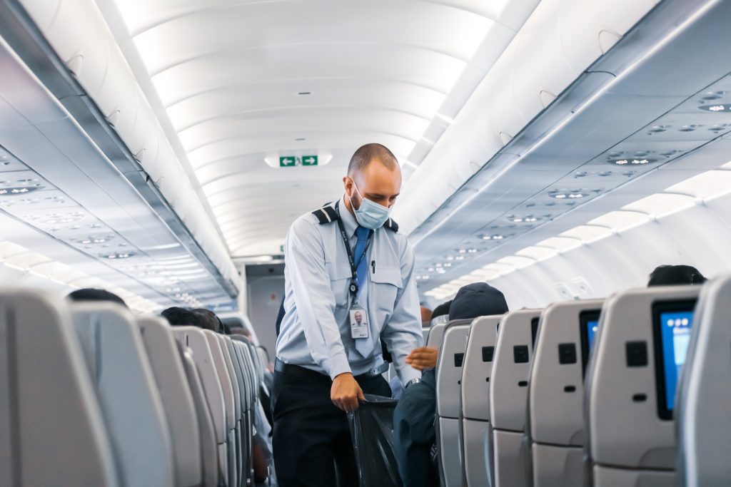 flight attendant wearing mask