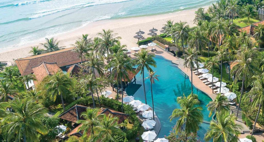 swimming pool and beach in vietnamese resort