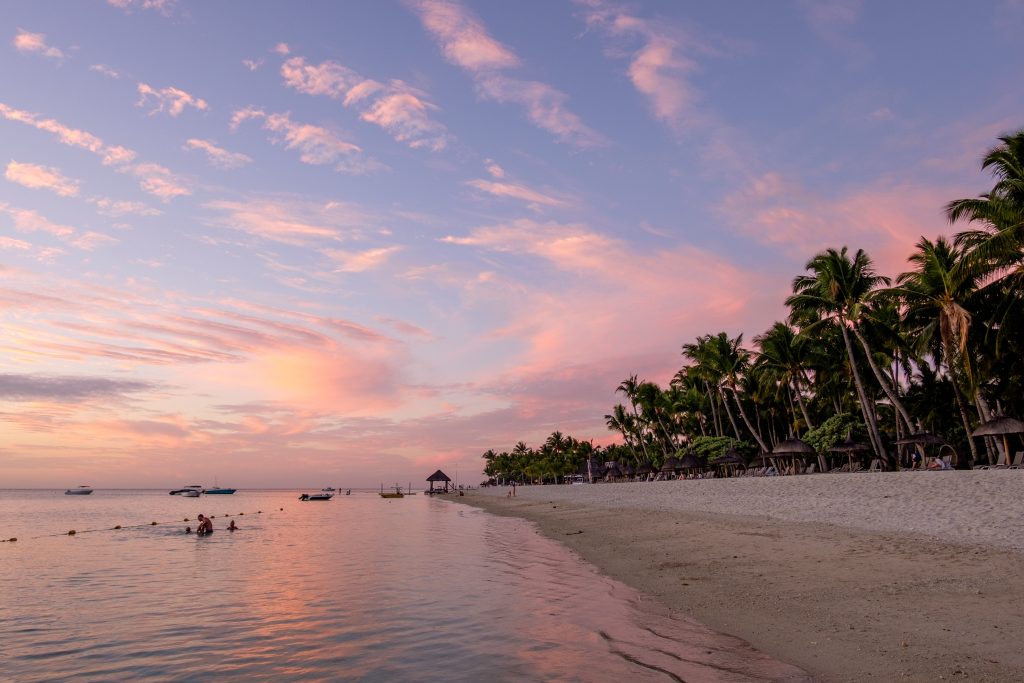 sunset on a beach in mauritius