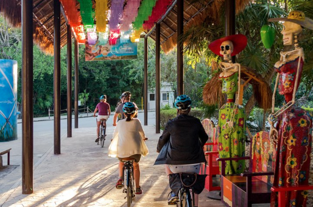 family cycling in tulum mexico