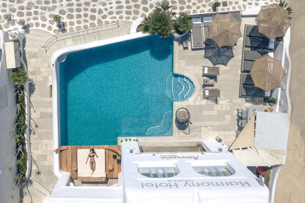 aerial view of a swimming pool at a hotel in mykonos