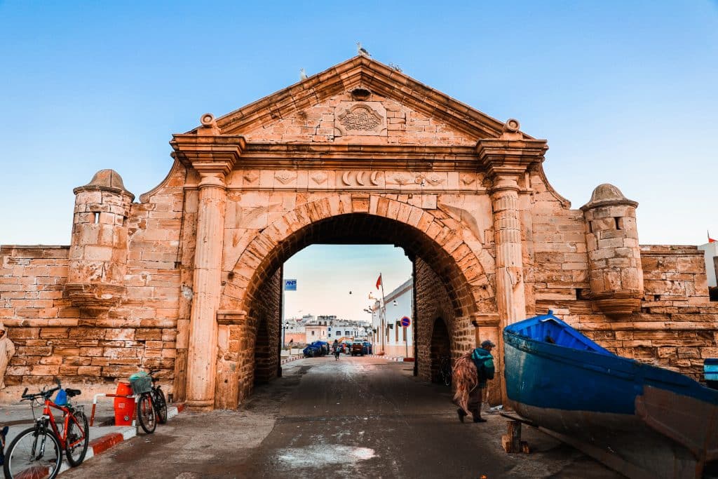 archway and harbour in essaouira