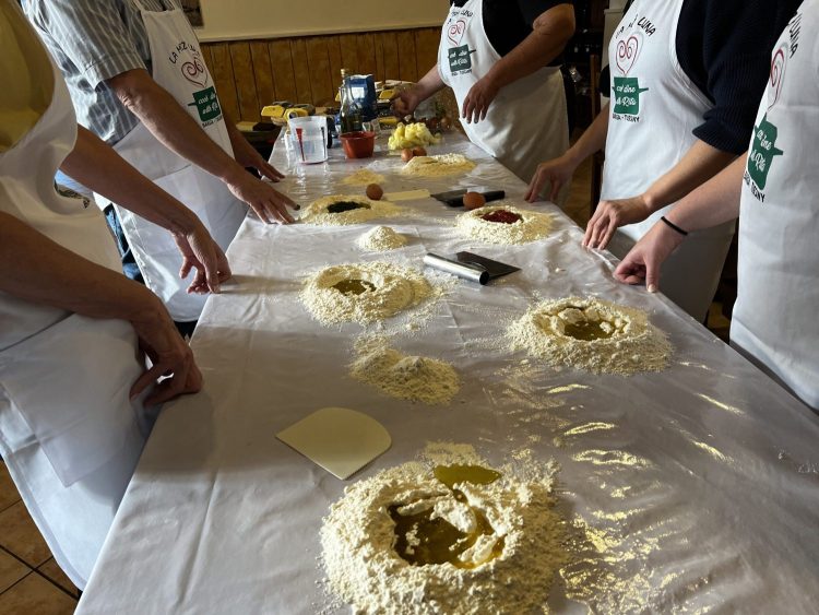 group making pasta dough
