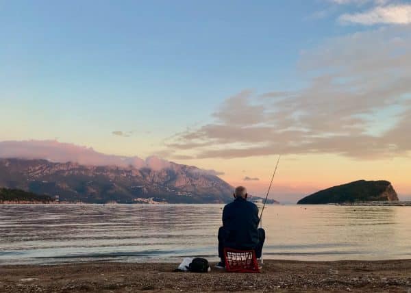 man fishing in montenegro