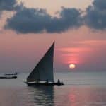 boat and sunset in tanzania