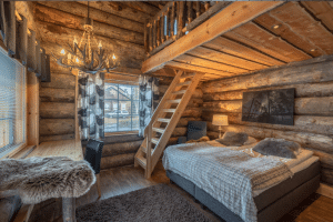 Spacious wood paneled log suite with views of arctic Lapland