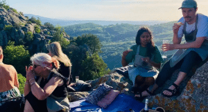Group enjoying a meal in the Tuscan countryside