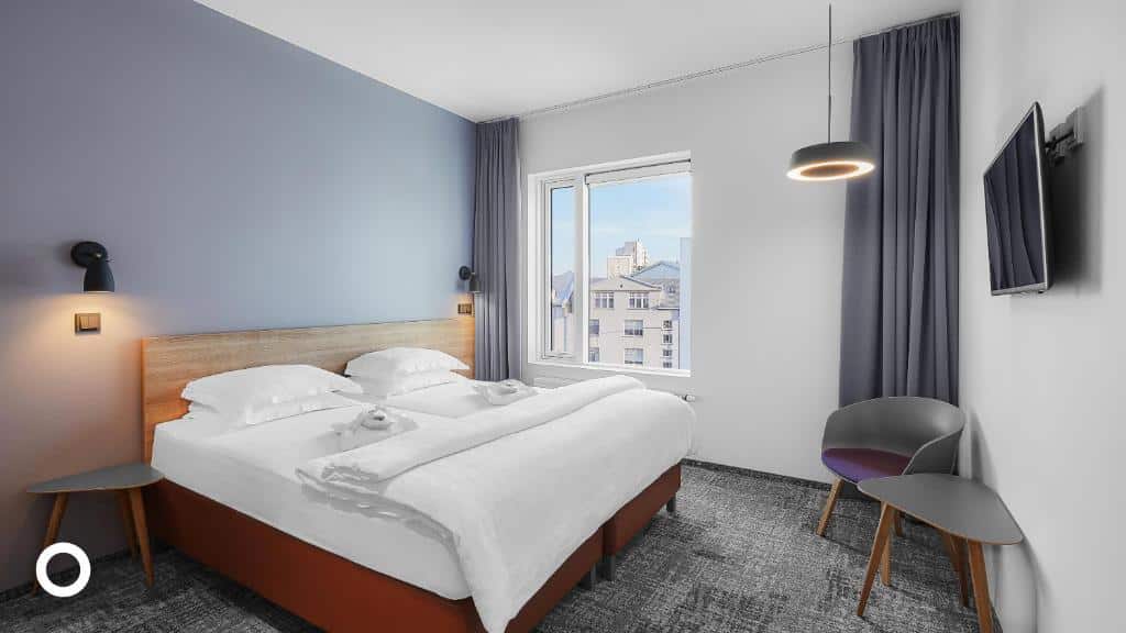 Double/Twin in 4* Centerhotel Midgardur (or similar)