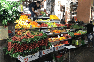 A local food market in Mauritius selling fruit