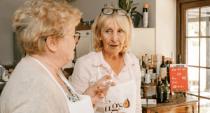 Two women chatting and having a good time at a cooking retreat in the Algarve