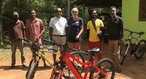 Team in Sri Lanka standing with their bikes before setting off