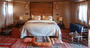 L:uxury desert camp glamping tent in Morocco