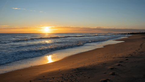 Sandy beach at sunset in Valencia