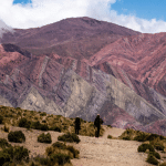 Desert like landscape in Argentina with people in the foreground