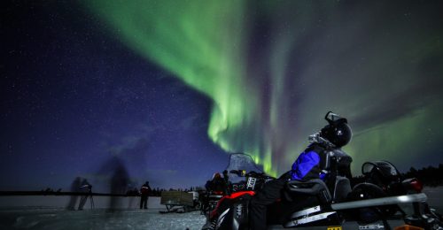 Northern Lights by Snowmobile image